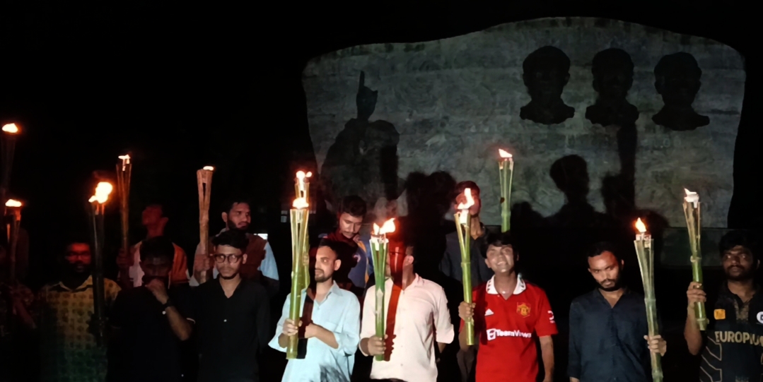 কোটা বাতিলের দাবিতে রাবিতে মশাল মিছিল