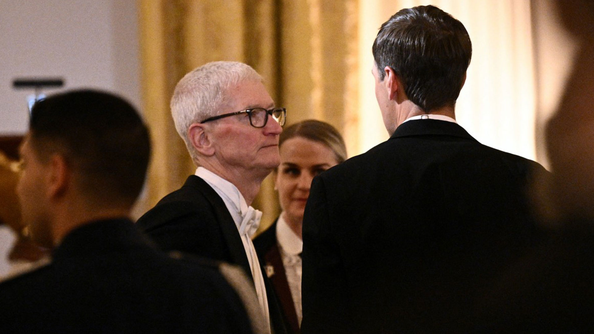 Apple CEO Tim Cook and Jared Kushner talk during State Dinner