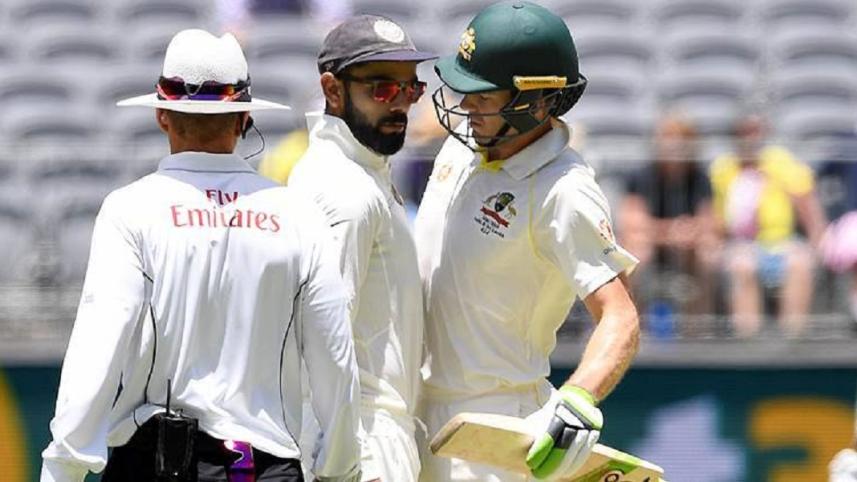 Tim Paine and Virat Kohli