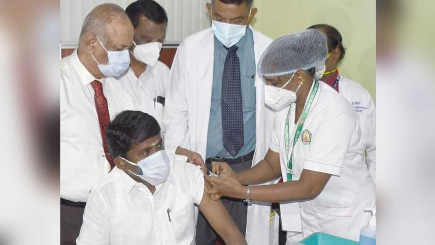 Tamil-HM-takes-Vaccine.jpg