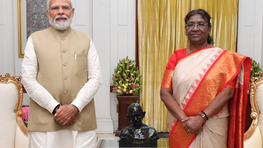 ভারতের বিদায়ী প্রেসিডেন্ট দ্রৌপদী মুর্মুর সঙ্গে নরেন্দ্র মোদি। ফাইল ছবি: স্টেটসম্যান