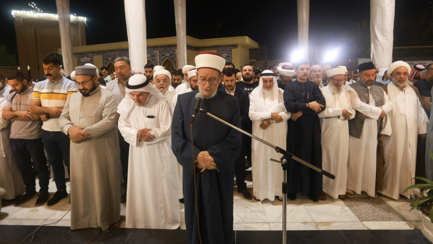 ইরাকে হানিয়ার গায়েবানা জানাজা । ছবি: এএফপি 