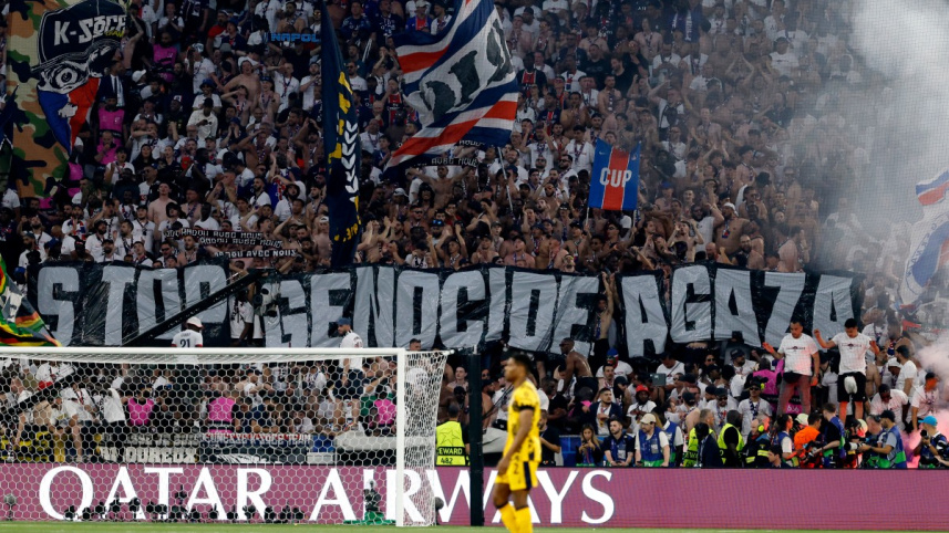 জার্মানির মিউনিখে চ্যাম্পিয়ন্স লিগের ফাইনালে দর্শকরা ইসরায়েলি গণহত্যাবিরোধী ব্যানার প্রদর্শন করেন। ছবি: এএফপি