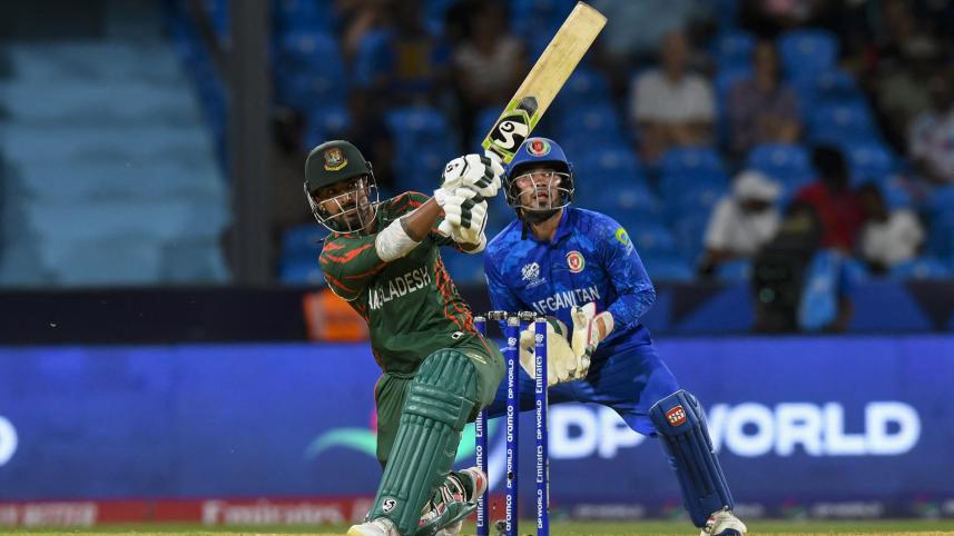 Bangladesh's Liton Das (L) hits four as Afghanistan's Mohammad Ishaq (R) looks on during the ICC men's Twenty20 World Cup 2024 Super Eight cricket match between Afghanistan and Bangladesh.jpg
