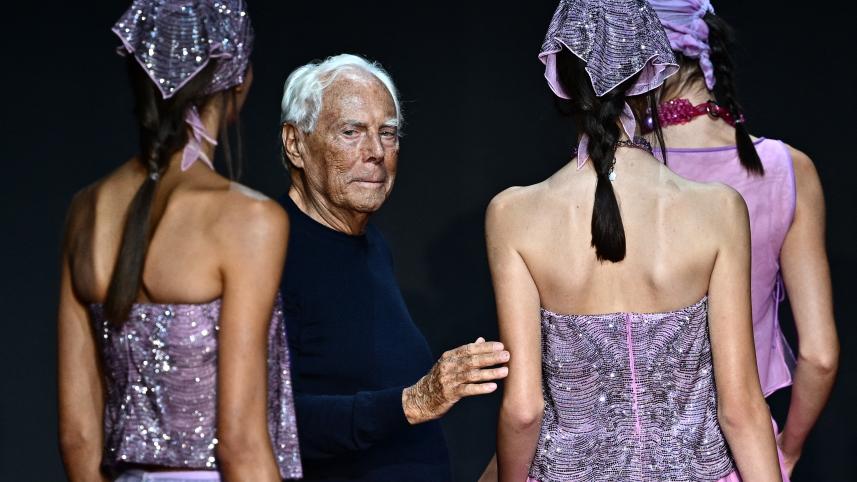 Giorgio Armani with models