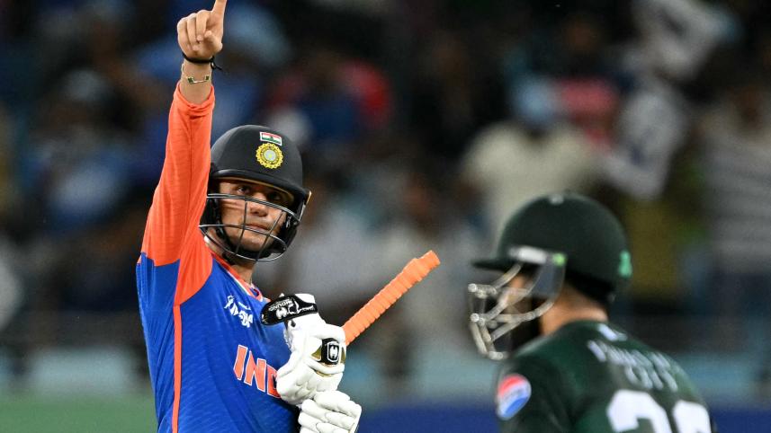 India's Abhishek Sharma celebrates after scoring a half-century (50 runs) during the Asia Cup 2025 Super Four Twenty20 international cricket match between India and Pakistan 
