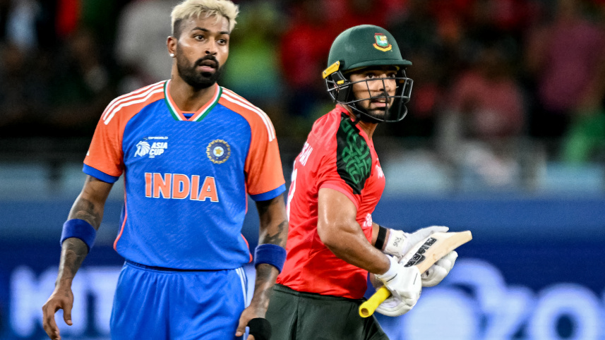 Bangladesh's Saif Hassan (R) watches the ball after playing a shot as India's Hardik Pandya watches.jpg