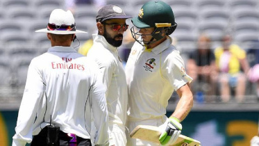 Tim Paine and Virat Kohli