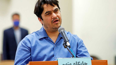 2020-12-08T123201Z_1937957463_RC20JK99IBLB_RTRMADP_3_IRAN-JOURNALIST.jpg