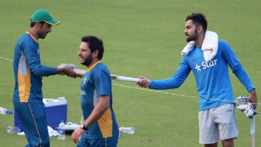 KOhli and amir.jpg