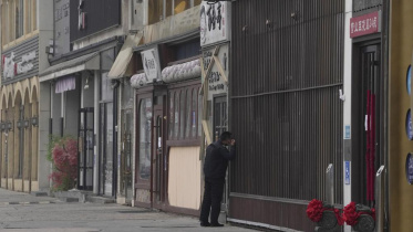 লকডাউনের কারণে বেইজিং এর সব রেস্তোরাঁ বন্ধ রাখা হয়েছে। ছবি: এপি