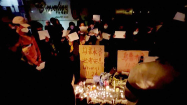 সাংহাইয়ে বিক্ষোভ : চীন সরকারের কঠোর ‘শূন্য করোনা’ নীতির প্রতিবাদ