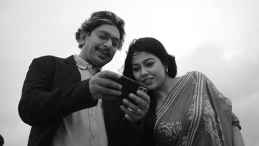 মনোগামী ছবিতে চঞ্চল-জেফার। ছবি: সংগৃহীত