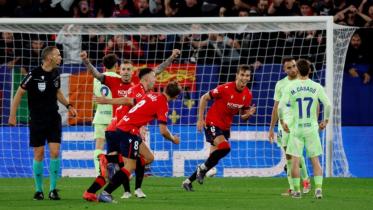 Osasuna's Abel Bretones celebrates with teammates 