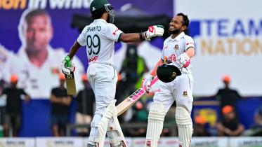 Mushfiqur Rahim (R) celebrates Najmul Hossain Shanto 