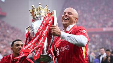 Liverpool's Dutch manager Arne Slot celebrates
