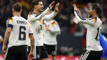 Germany's midfielder #19 Leroy Sane (R) celebrates with Germany's midfielder #08 Leon Goretzka